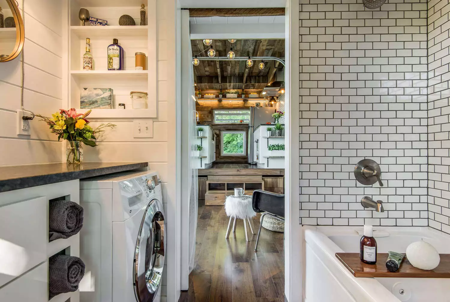 The bathroom features a small sliding door for privacy