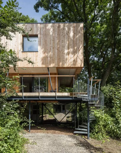 The home is clad with untreated Larch