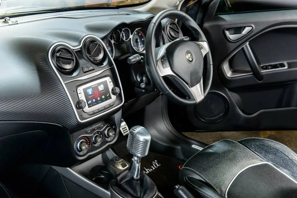 The regular shift knob is replaced by a repurposed microphone