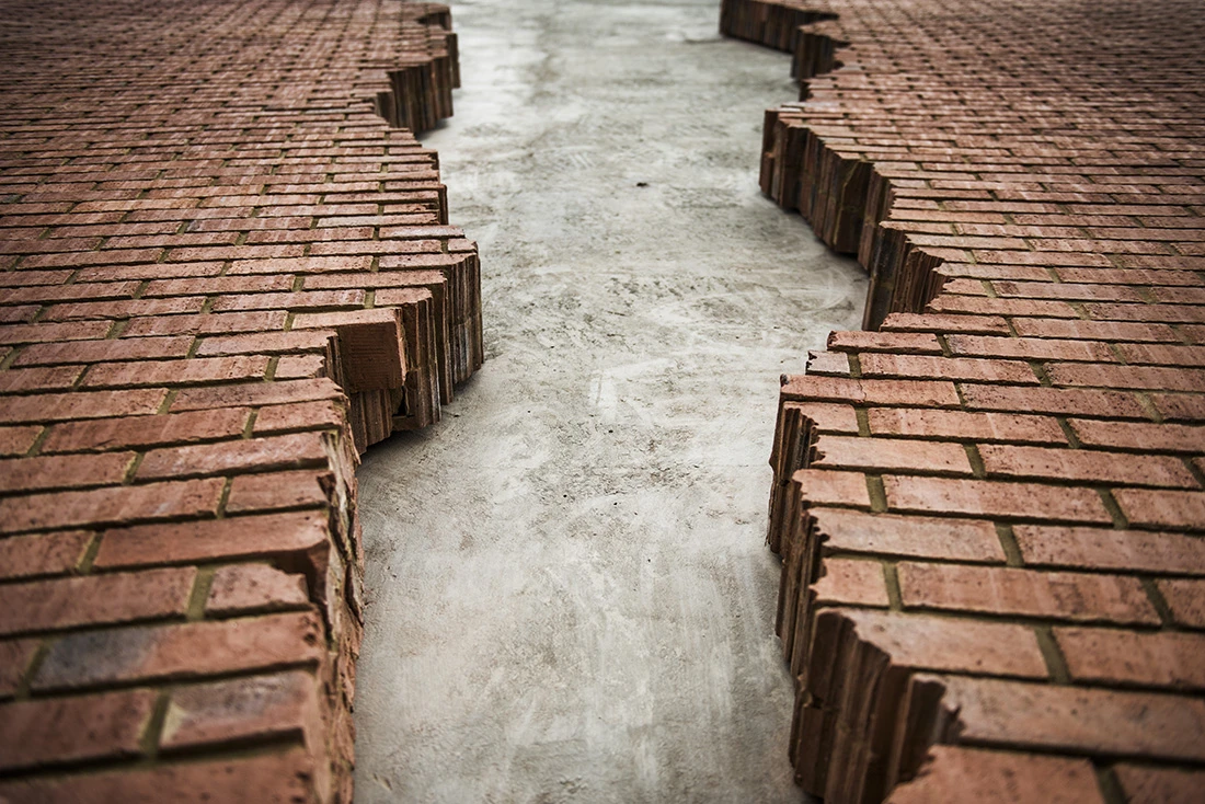 Six pins and half a dozen needles is Chinneck's first permanent installation, which took a team of British engineers, steelworkers and brick layers 14 months to develop