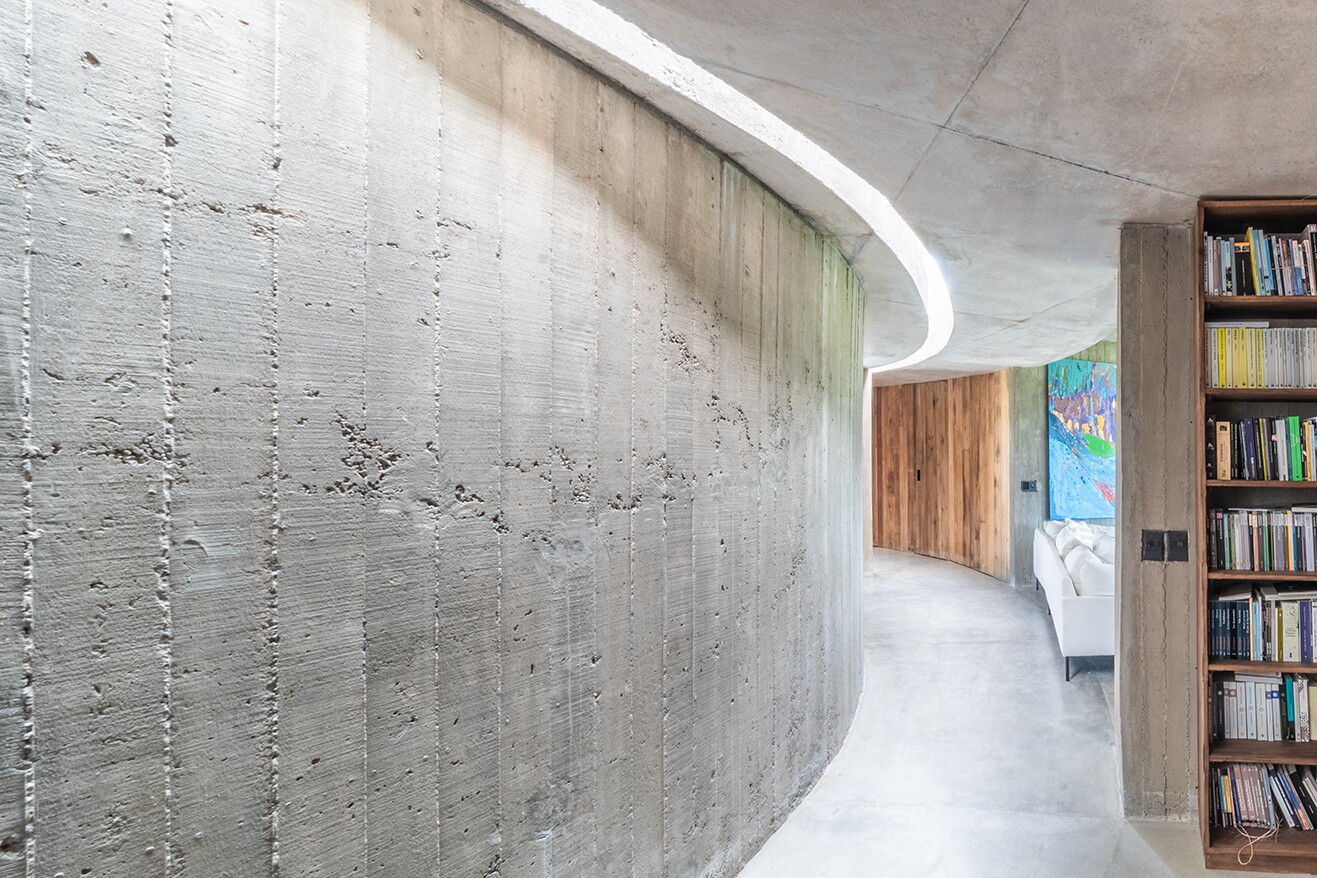 The Shire's interior decor is made up of exposed concrete and wood