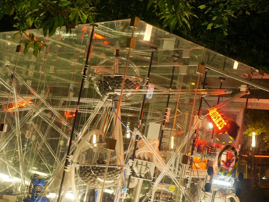 The machine is illuminated at night-time