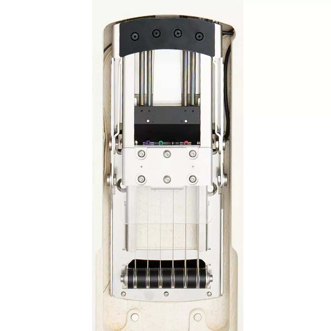 The folding mechanism inside the body keeps the strings in place and under light tension in travel mode, with locking tuners and a roller bridge helping to keep everything in tune when unfolded for play