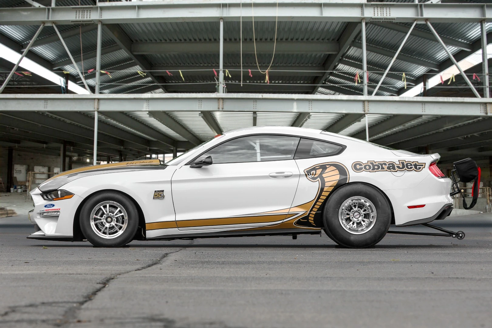 Two-way coil-over shocks and a low-drag disc braking system from Strange Engineering keeps the wheels to the ground, while a four-link rear suspension with antiroll and panhard bars keeps things steady