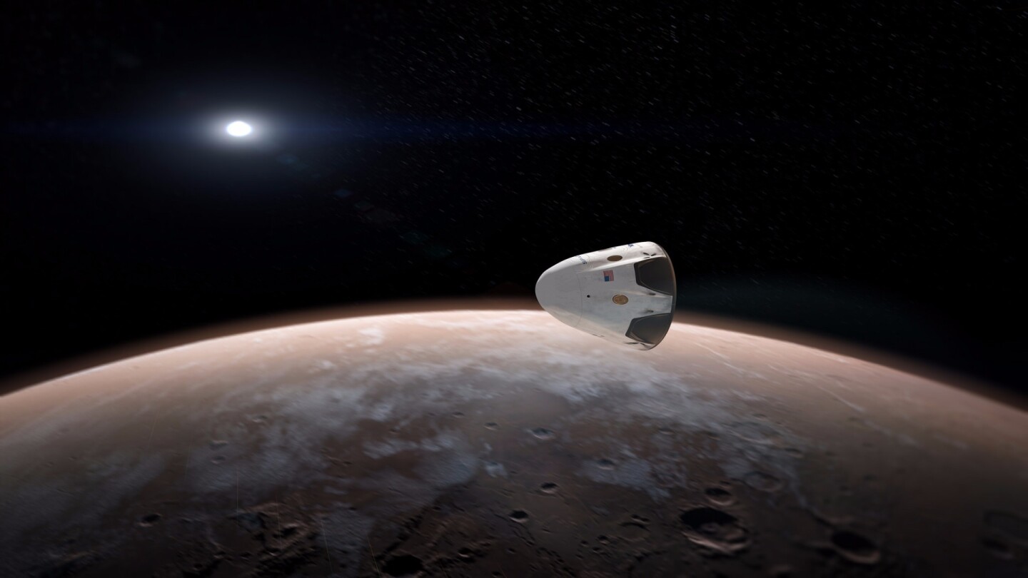 Artist's concept of a SpaceX Dragon orbiting Mars