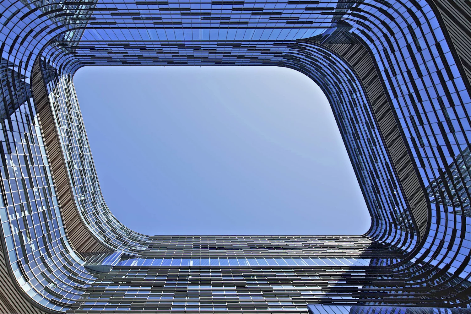 America's David Crawford's entry contrasts the blue of the sky with the Samsung Electronics HQ building in San Jose, California, by NBBJ. The image was entered into the Exterior category