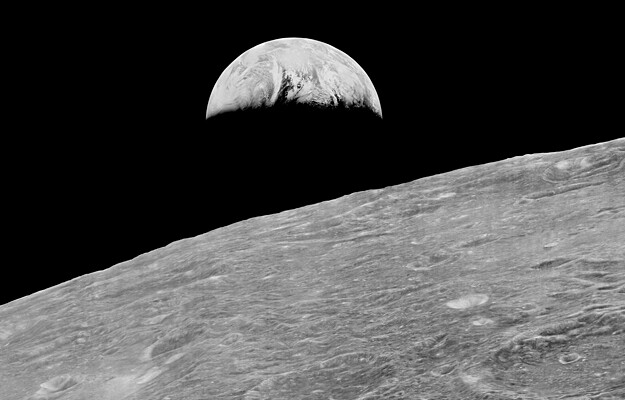 The first "Earthrise" image captured in 1966