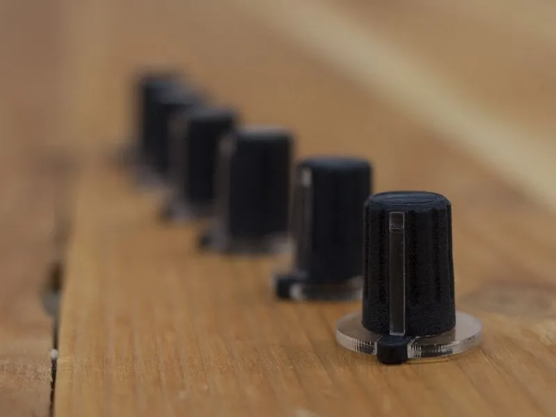 Placed correctly to align with the virtual knobs on-screen, a conductive rubber grip combines with a conductive surface on the underside