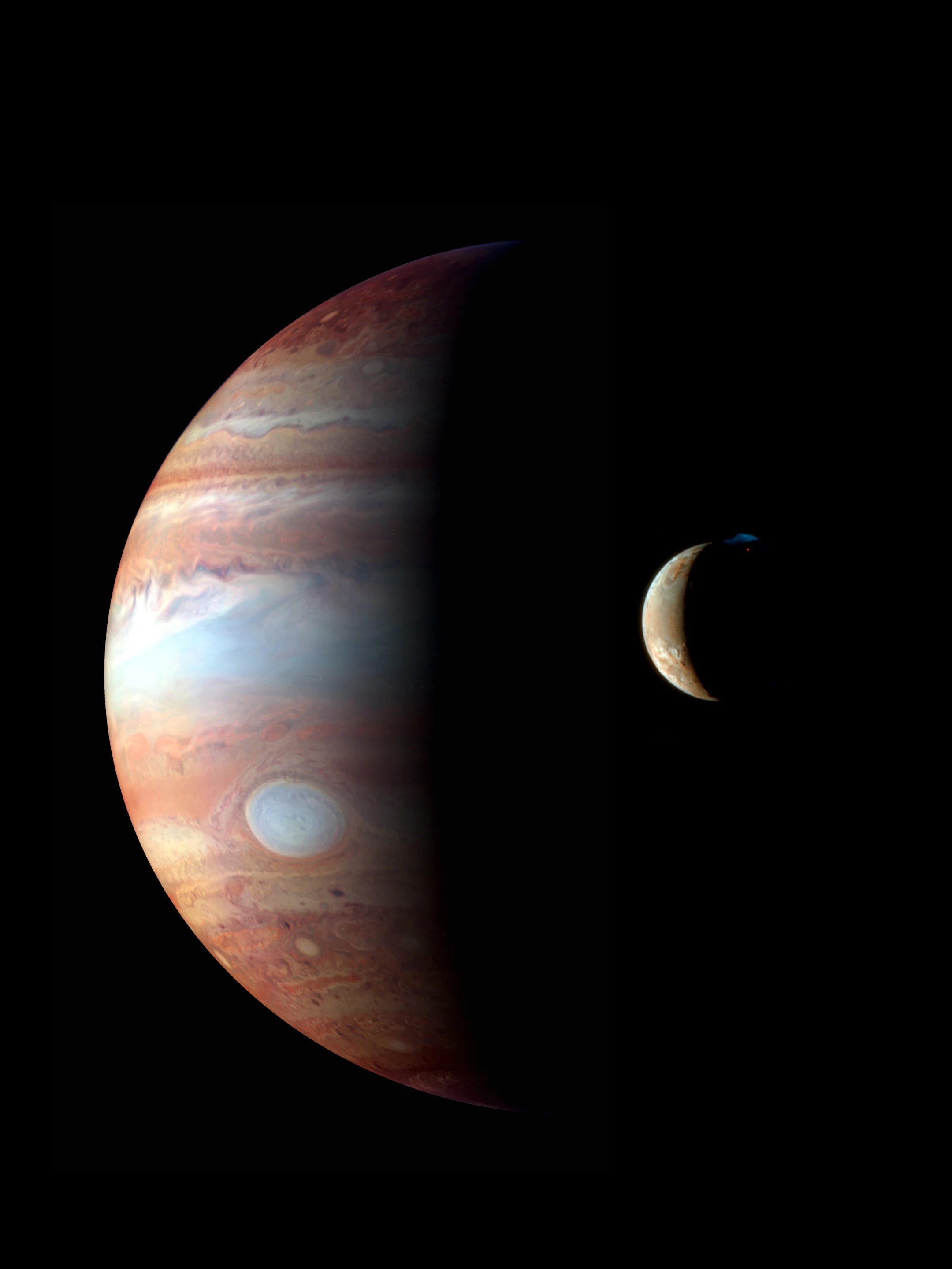 Jupiter and her volcanic moon, Io (Image: NASA/JHU/APL)
