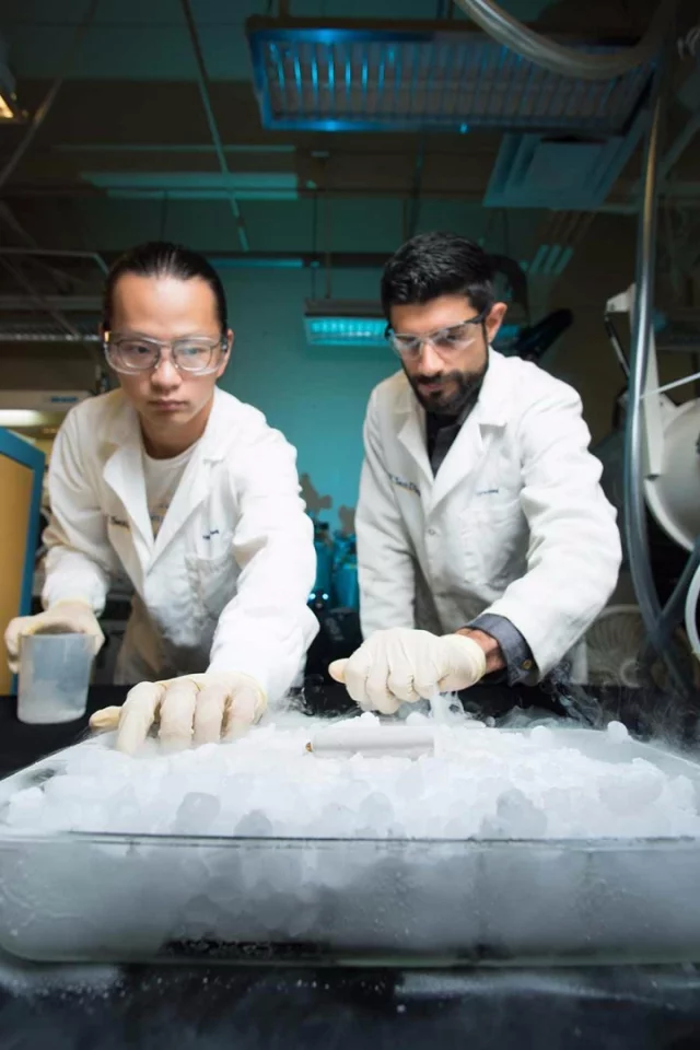 UC San Diego researchers Yangyuchen Yang (left) and Cyrus Rustomji