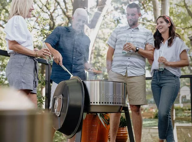 According to Solo Stove, its new grill design creates hotter temperatures and requires less fuel than a regular charcoal grill