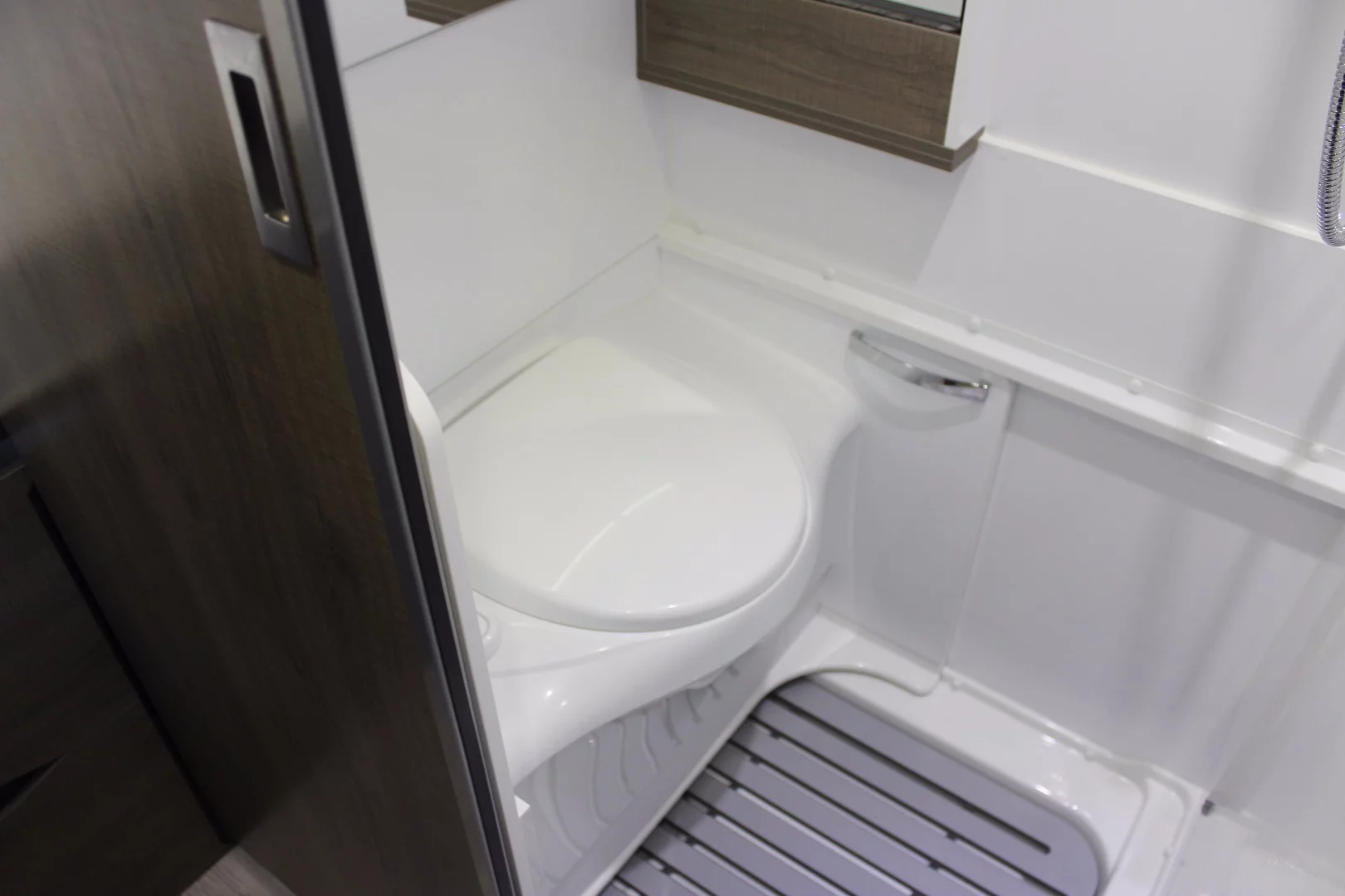 The most interesting part of the Mooveo Van 60 DB is the flexible bathroom, in which the toilet retracts to clear the shower floor