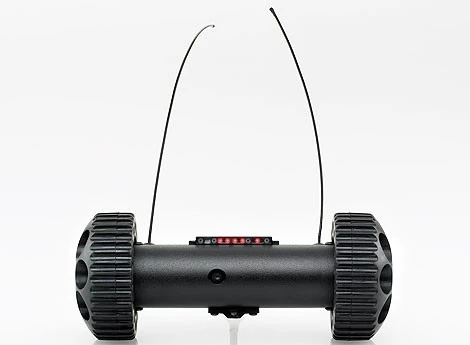 After pulling an activation pin, the hardy robots can be thrown into place, or fired from a tear-gas launcher.