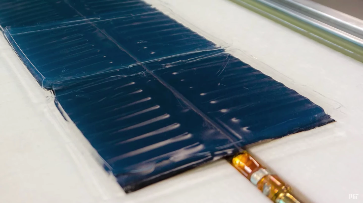 A close look at the aerogel-covered, black-coated copper plate, which heats water contained in pipes on its underside