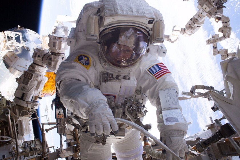 Peggy Whitson pictured working on the ISS during her seventh spacewalk
