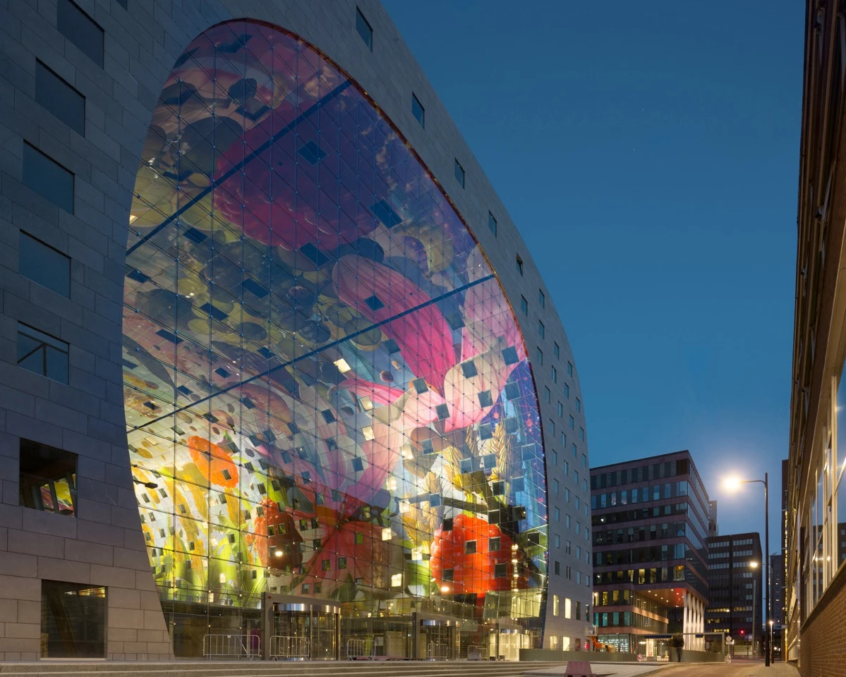 A close-up view of the Markthal illumiated at night