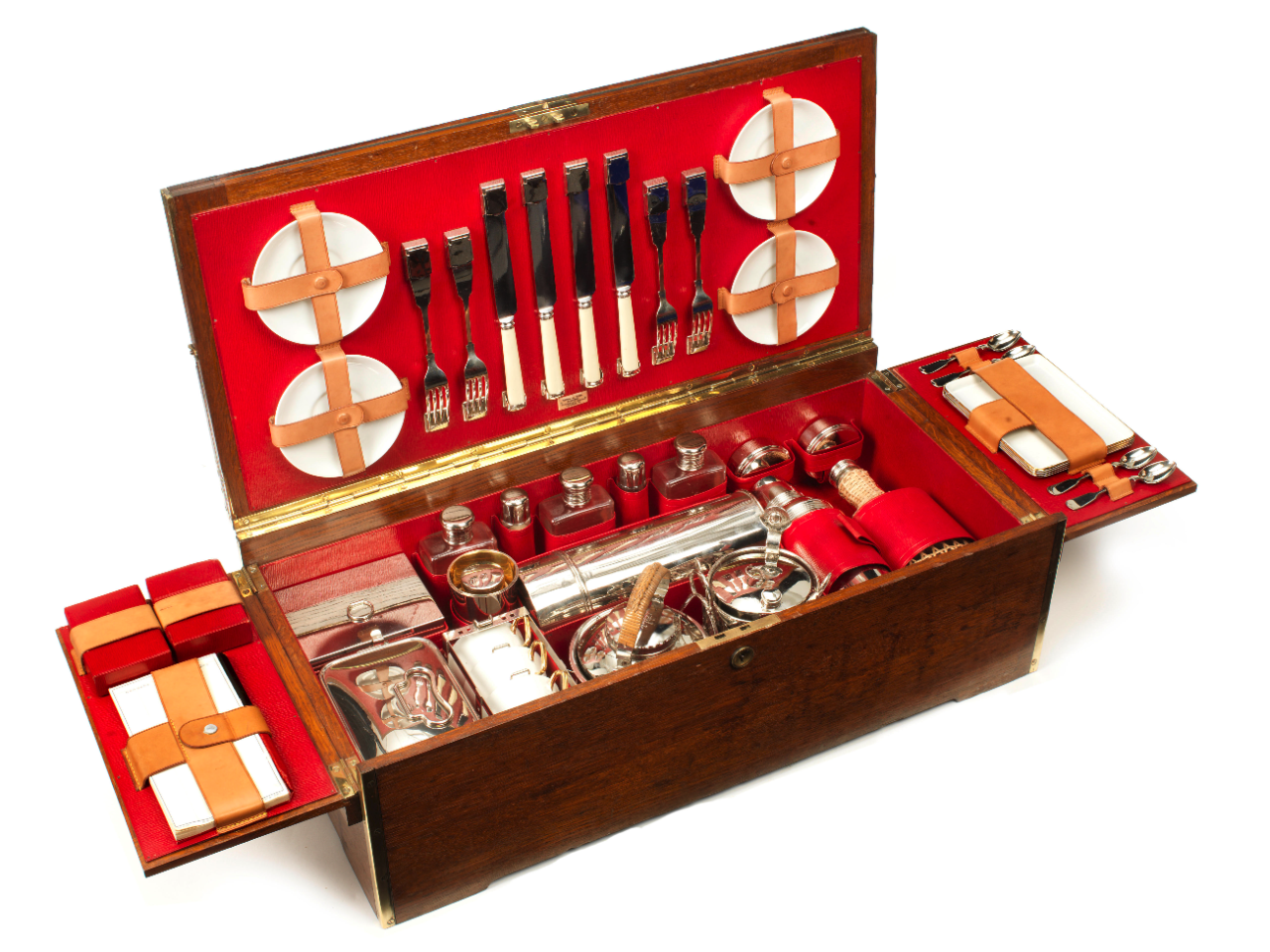 With the advent of the automobile, one of the primary ploys for "pitching woo" was the invitation of the subject of one's affections on a picnic. Hence, the above was the sort of thing that might be carried in the trunk of a car for a day in the countryside a century ago. This picnic set for four is combined with a playing table for games, and was built by Drew & Sons of Piccadilly circa 1909. The picnic set failed to meet reserve, but there were a half dozen others that ranged from $1,000 to $2,000, one that didn't sell at $30,000 and several others that are still available heading ever upmarket.
