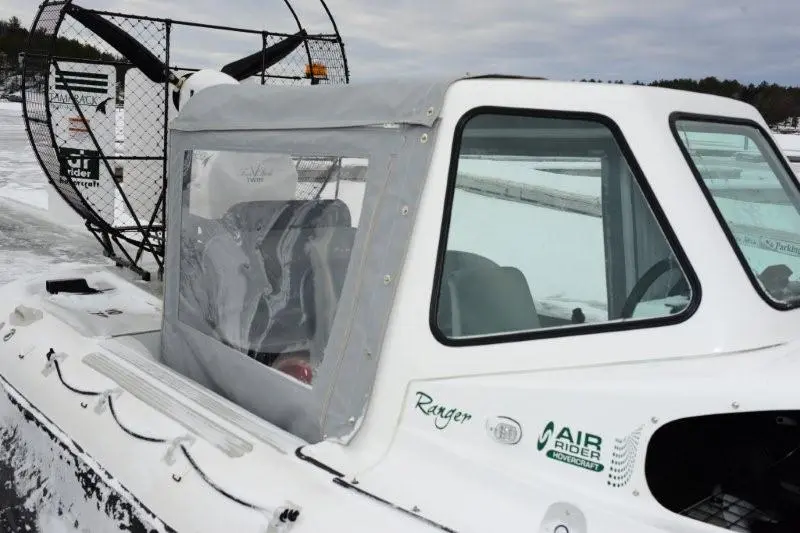 AirRider hovercraft with weather canopy with canvas elements erected