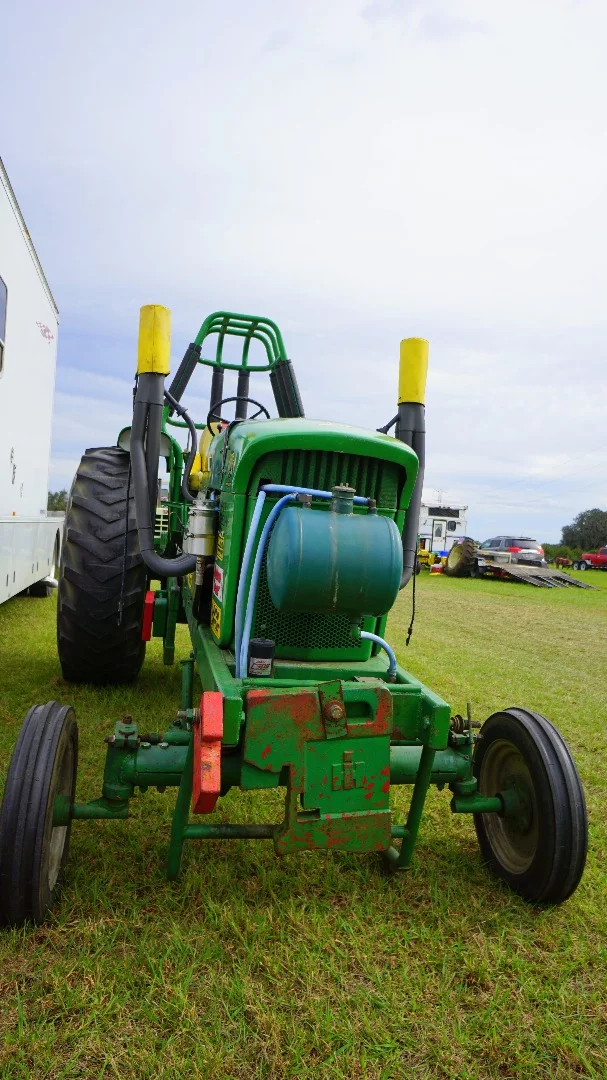 Notice the counterweights (large green plate and red plate) getting the amount and placement of these correct is much of the secret to winning