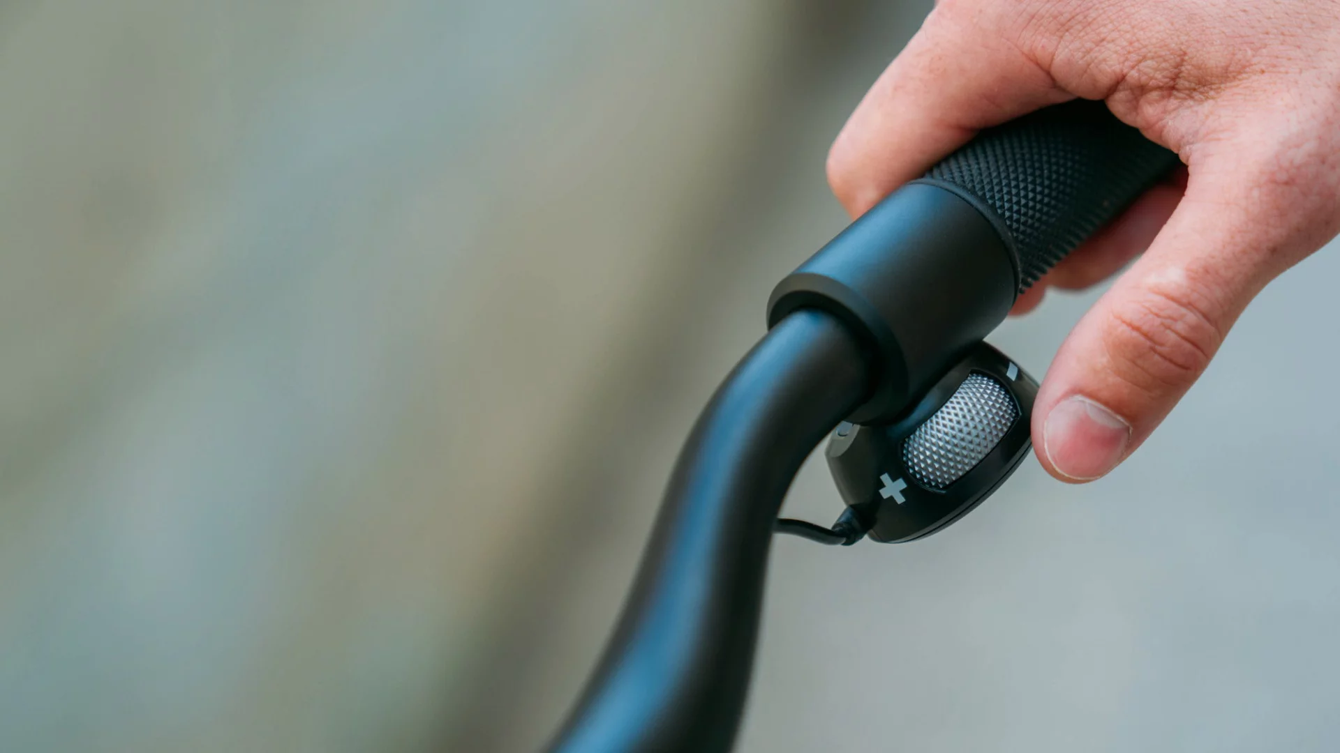 The throttle wheel on the Rev scooter