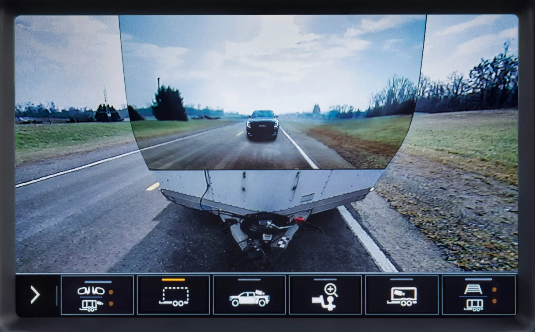 Transparent trailer view combines the outputs of the reversing camera and the trailer-mounted rear view camera to let you look through your trailer as if it's not there