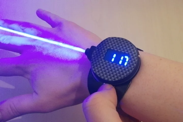 The LaserWatch displaying the time ... and doing that other thing
