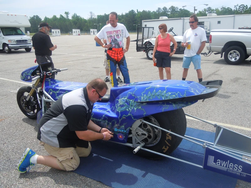 The Lawless/OCC crew prepare the Electric Rocket for its warm up run