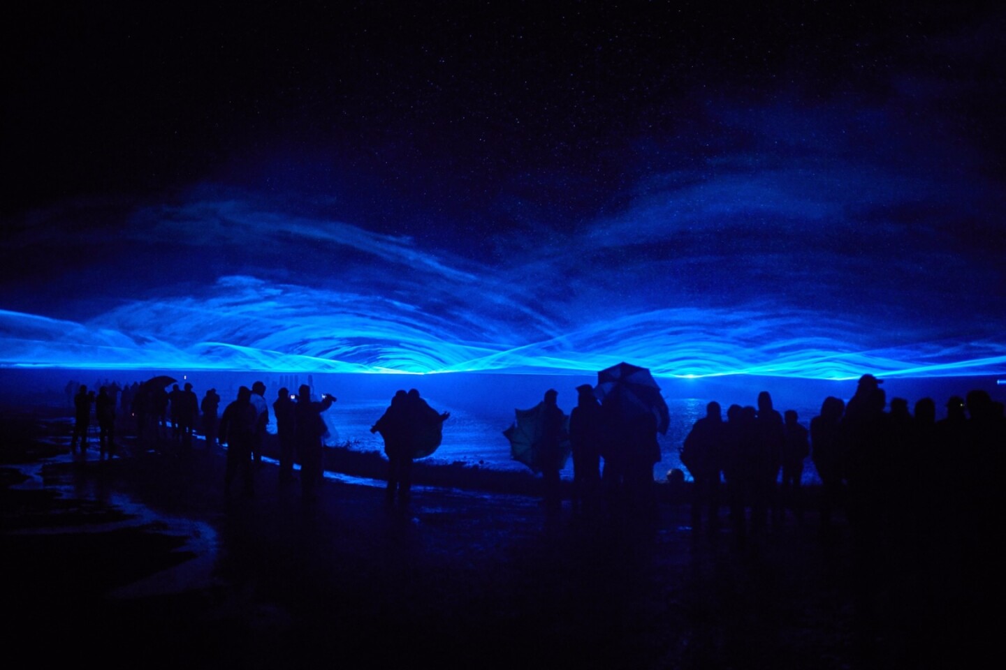 Waterlicht uses LED laser technology, software and lenses used to create wavy blue lines of light