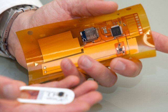The flexible adhesive patch contains an electronic circuit, communications antenna, controller chip, and a microfluidic paper-based sweat-sampling system (Photo: University of Cincinnati)
