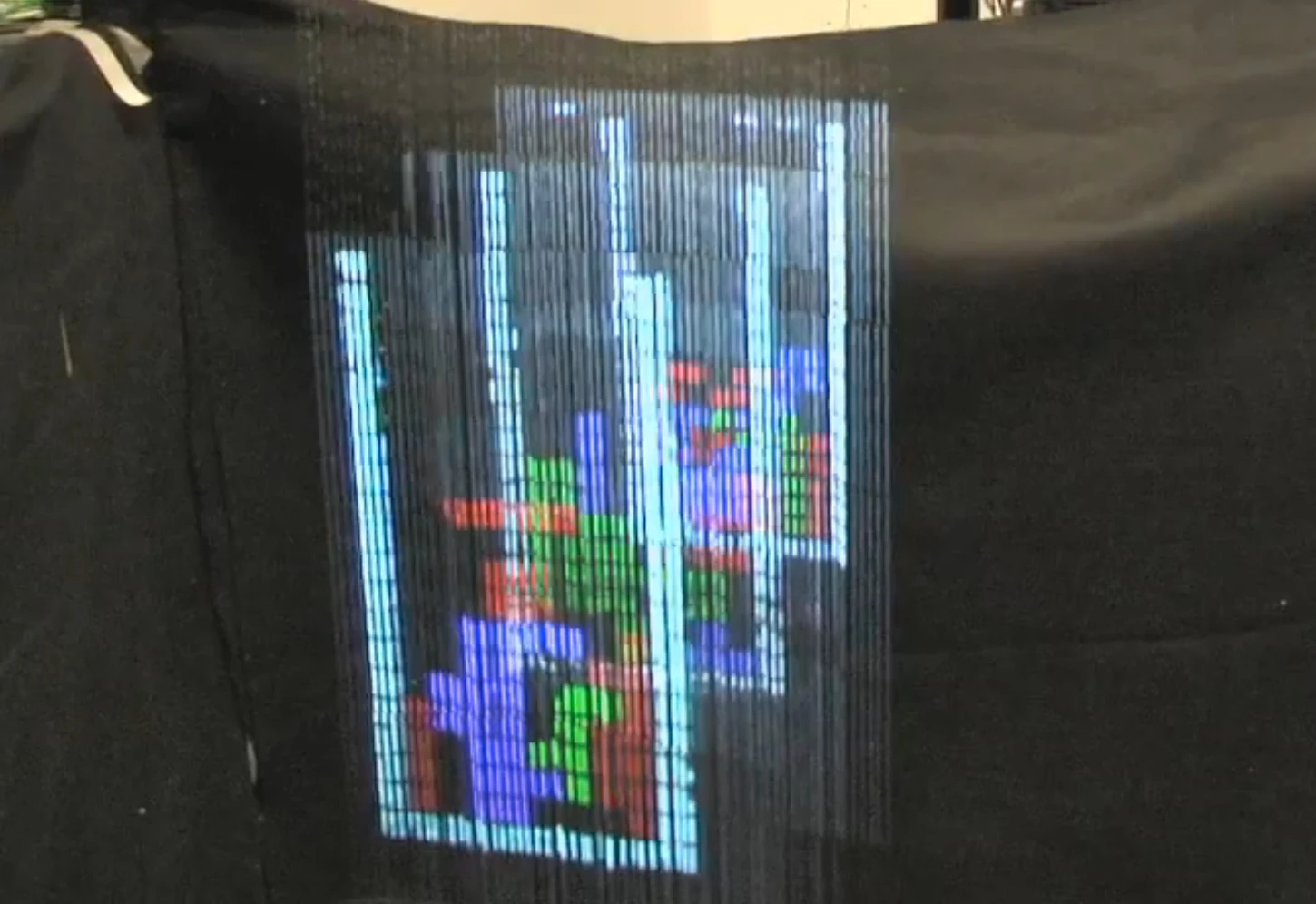 A multi-dimensional Tetris game on the AquaLux 3D