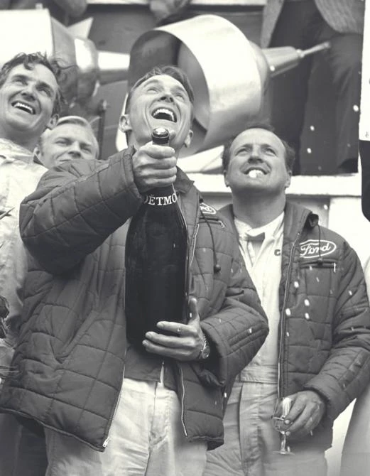 This is it - the very first time champagne was sprayed on a victory dias at Le mans in 1967. Dan's spontaneous gesture saw the crew, Carroll Shelby and Henry Ford III all sprayed.