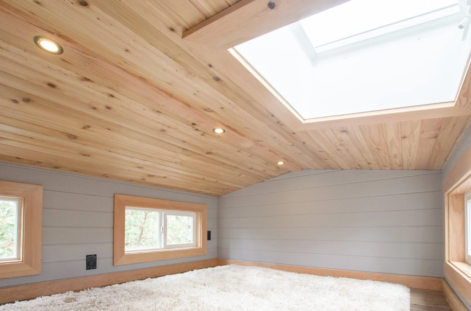 The Blue Heron's loft bedroom includes a skylight
