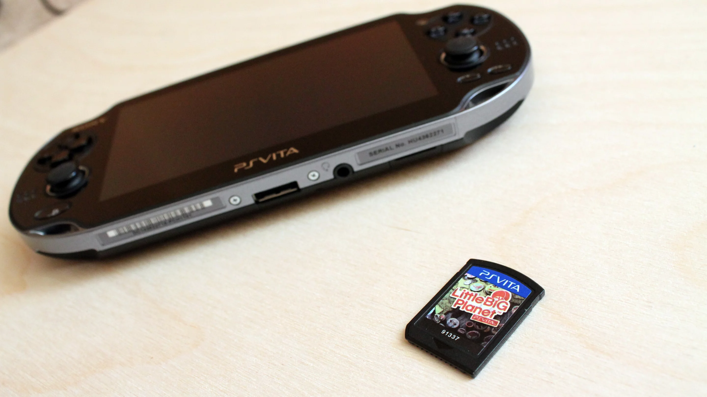 You can't use old PSP discs, but Vita games come as both retail cartridges and digital downloads