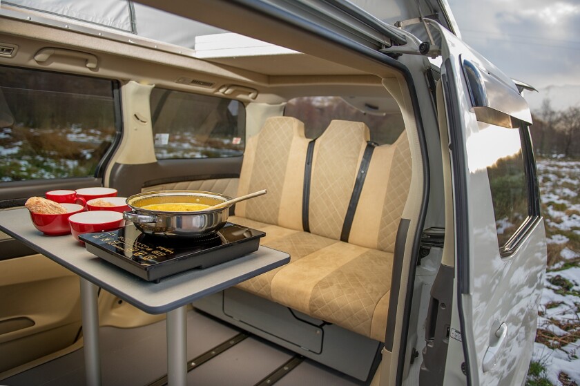 The table becomes both a meal-prep counter and a dining table