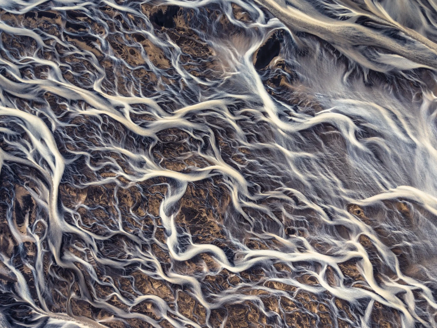 This photo won Gold and Silver awards in Moscow international photo awards 2018. Icelandic glacial river