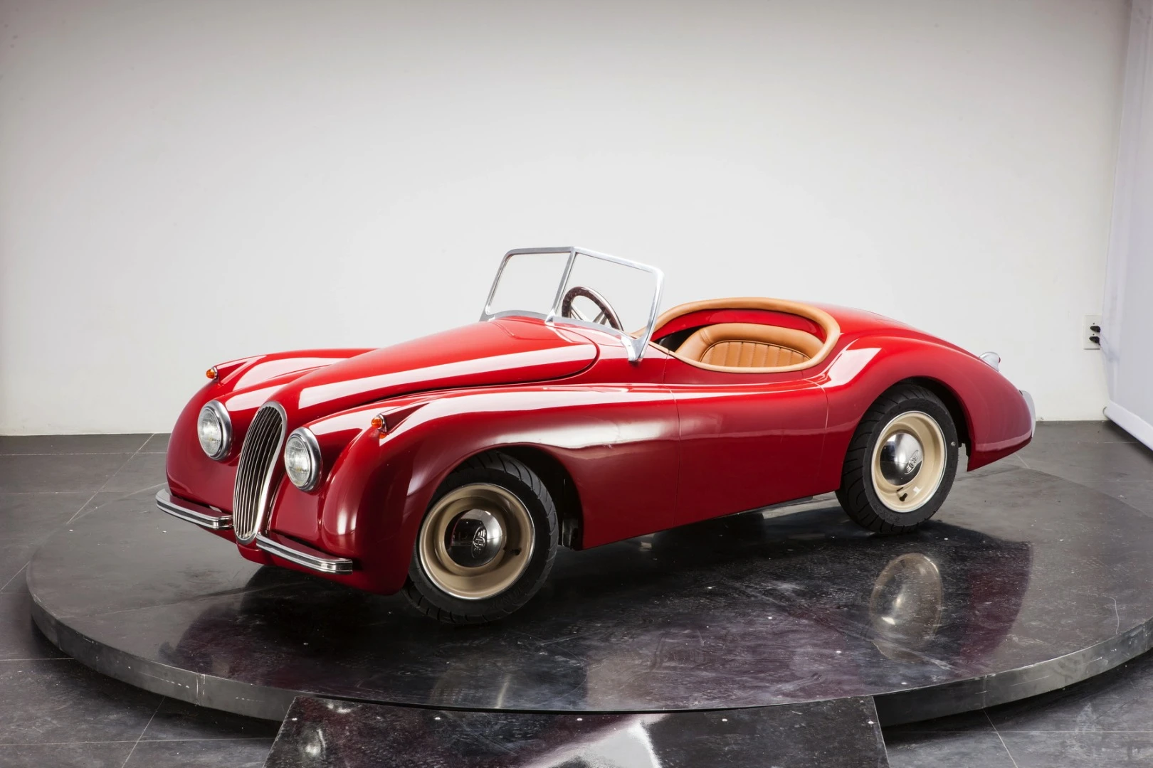 The ex-factory retail prices for the XK120 is £7,999, US$12,399 or €11,299 depending on the customer 's preferred currency, with shipping costs on top of that