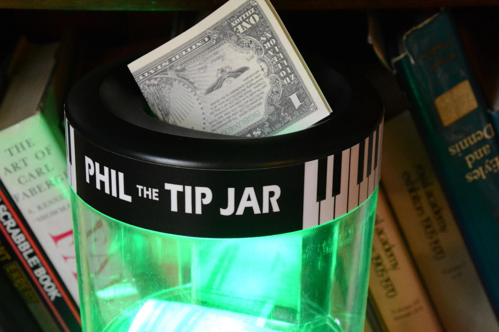 IR sensors in Phil the Tip Jar's money slot register objects going through the money slot, and trigger a card to be dispensed