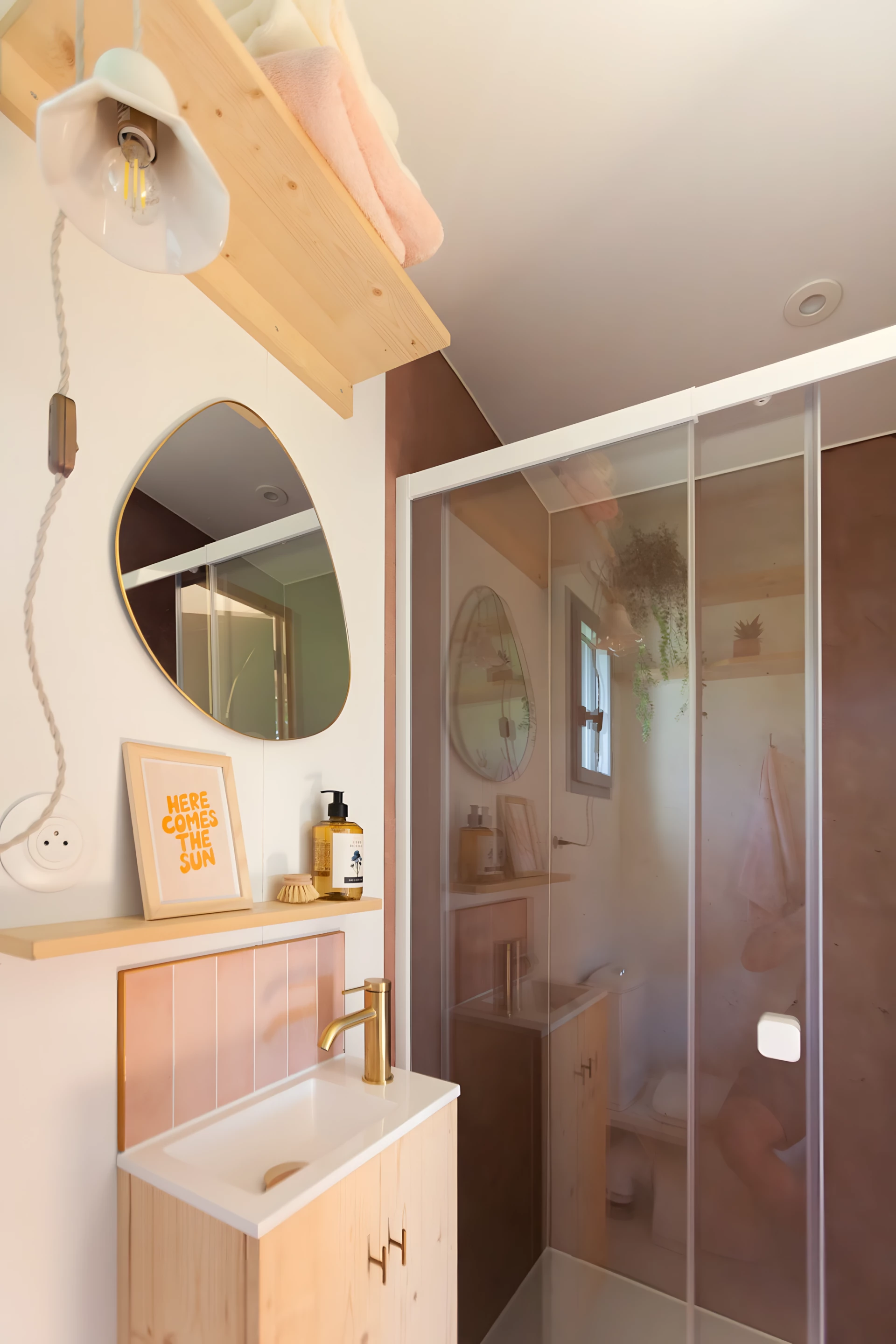 The Botanical Cabin's bathroom includes a shower, sink, and toilet
