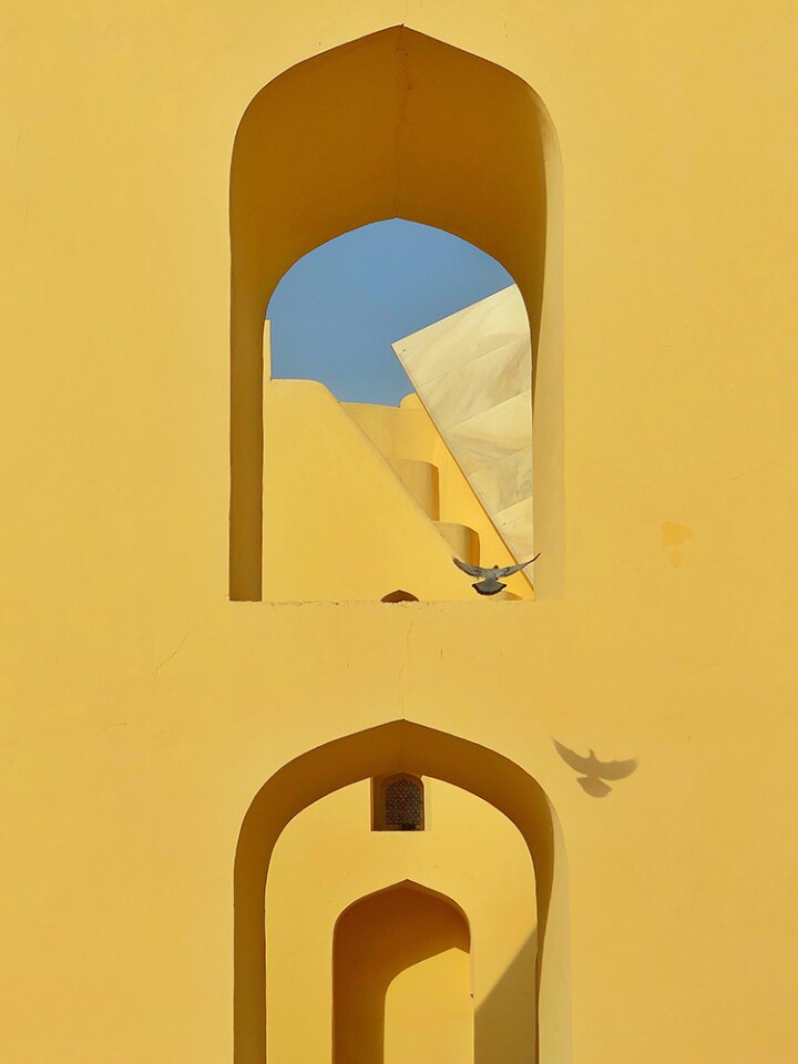 1st Place, Architecture. Janta Manta Observatory, Jaipur, India, iPhone X. “Janta Manta Observatory is very sci-fi looking. I captured the flying pigeon with the building to give the photo a dynamic feeling.”