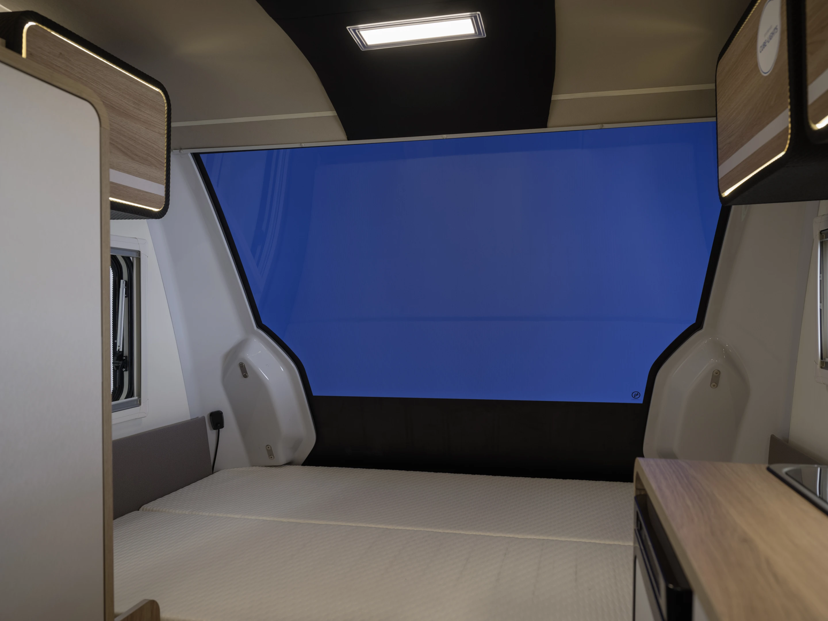 The dimming glass can adjust on a sliding scale between dark and clear