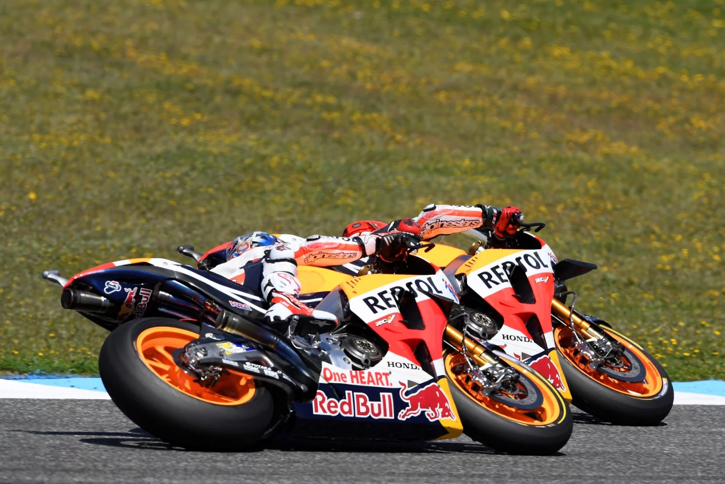 The two Repsol Honda riders, Marc Marquez and Dani Pedrosa, racing on different wing variants