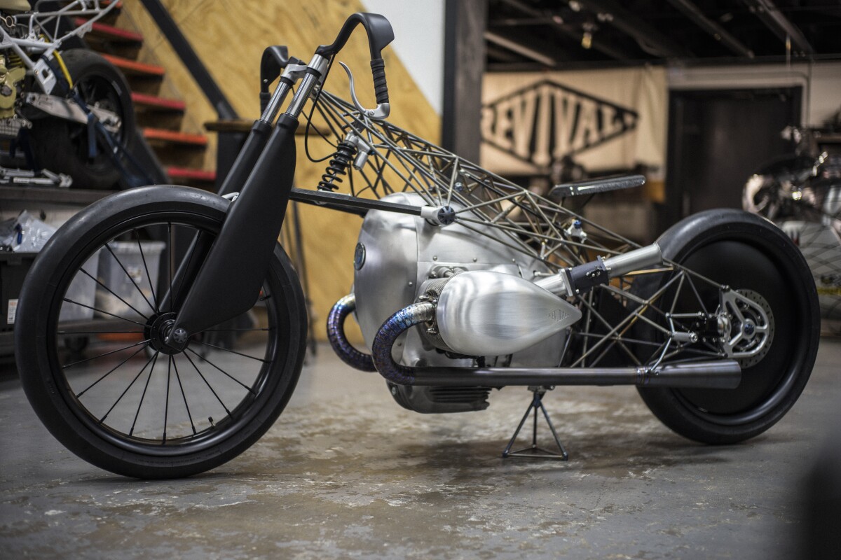 Six weeks ago (in April, 2019), a second custom bike using the BMW prototype engine appeared at the annual Handbuilt Show in Austin, Texas. Austin is also the home of renowned American custom craftsman Alan Stulberg's Revival Cycles, and the 'Revival Birdcage' show bike was clearly inspired by Ernst Hennes' speed record BMW machinery from the late 1920s and early 1930s, which wore similar polished aluminum teardrop valve-gear covers.