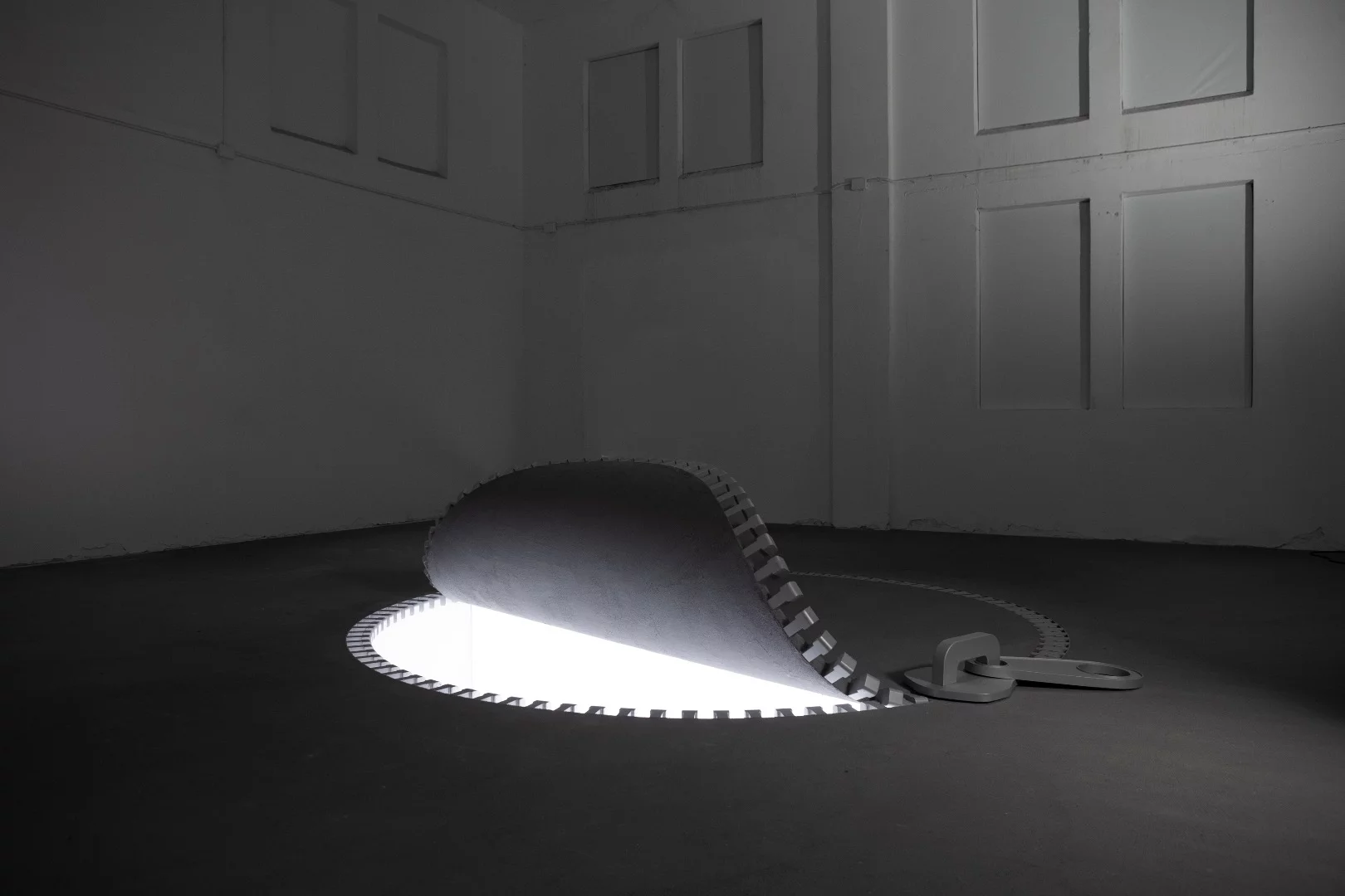 The interior of IQOS World features another two zip installations