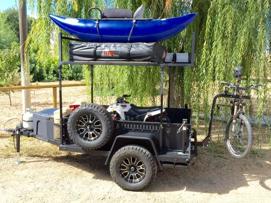The UGOAT Scout equipped as a toy-hauler with roof-top tent
