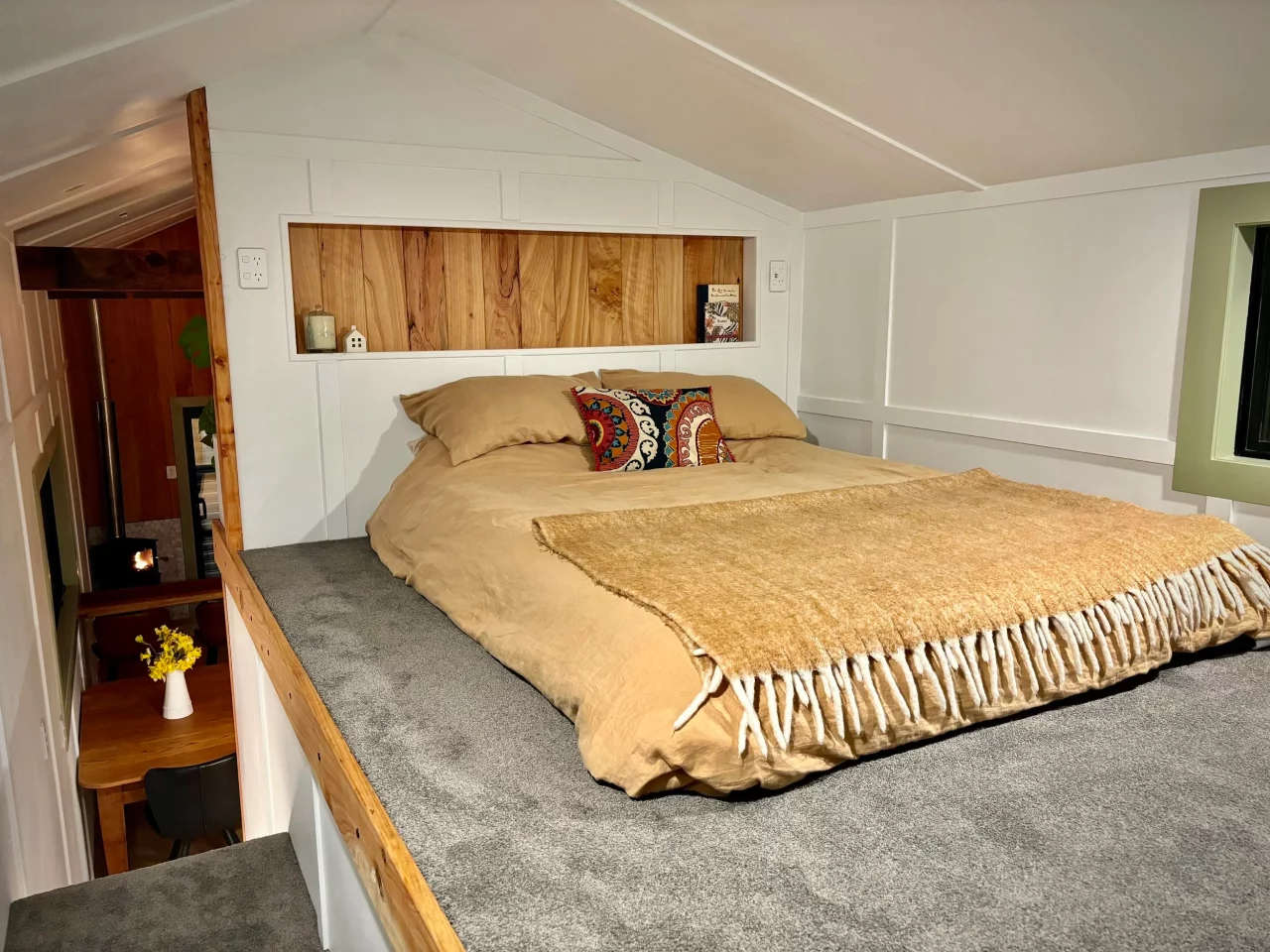 The Redwood's loft bedroom includes a lowered standing platform to make it easier to get dressed