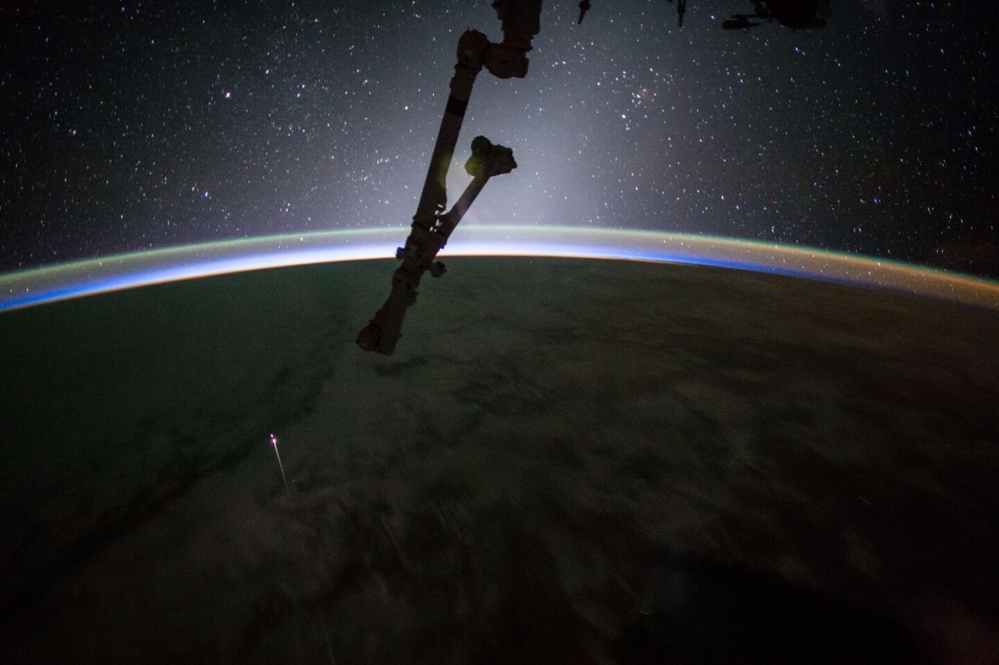 The Dragon spacecraft seen making its reentry burn from the ISS