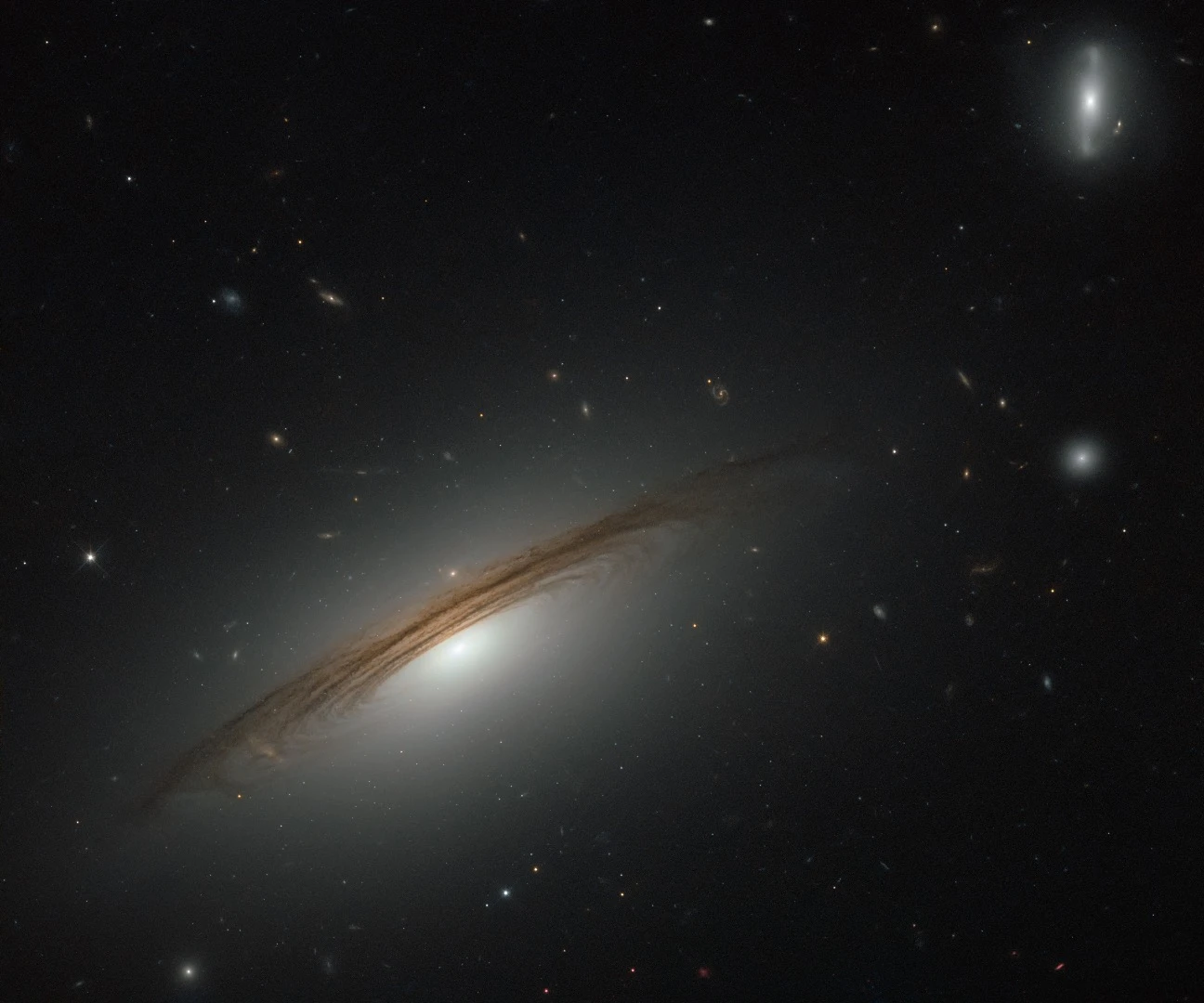 Classified as an S0/Sa galaxy, UGC 12591 sits somewhere between a lenticular and a spiral, and it is huge, about four times the mass of our Milky Way