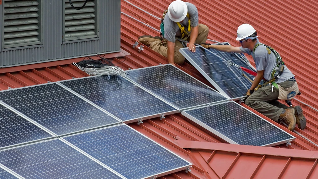 Traditional solar panels being installed (Image: Wayne National Forest via Flickr)