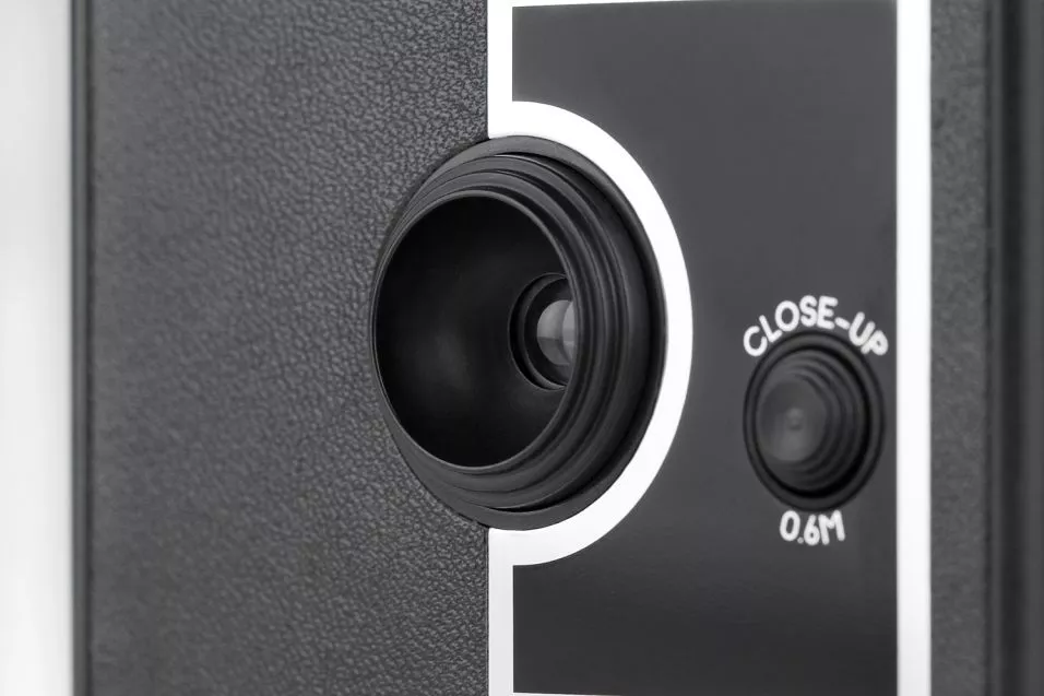 The LomoKino has a fixed-focus lens, with close-up mode