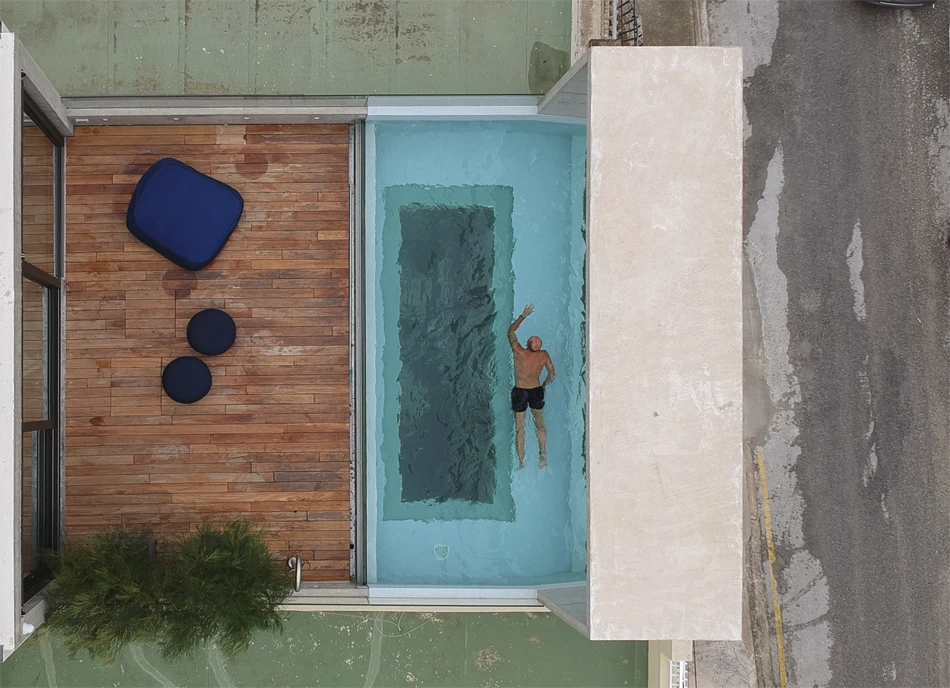 Casa B's rooftop pool offers a view of the home's interior below